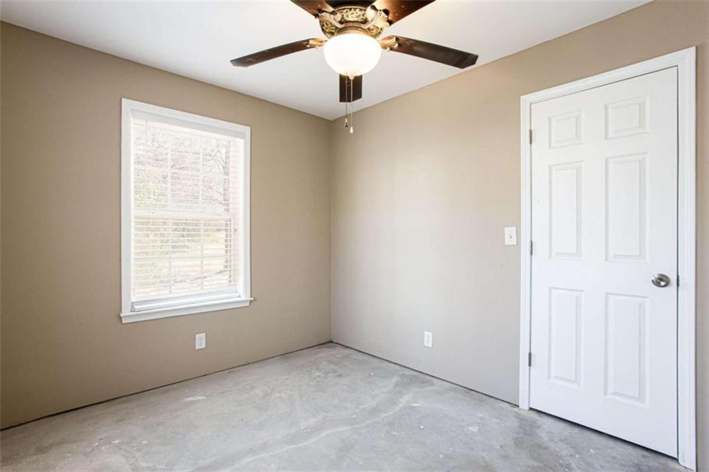 3721 Bogan Mill Road Northeast Buford, GA 30519 - Photo 48 of 58 a view of an empty room with a window
