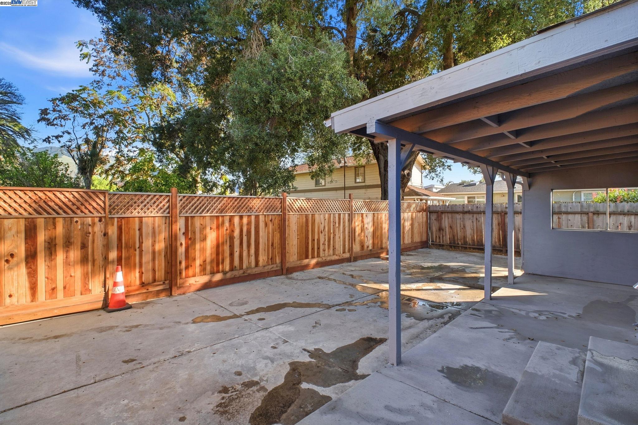 38016 Vallejo Street Fremont, CA 94536 - Photo 25 of 32 a view of a backyard with wooden fence