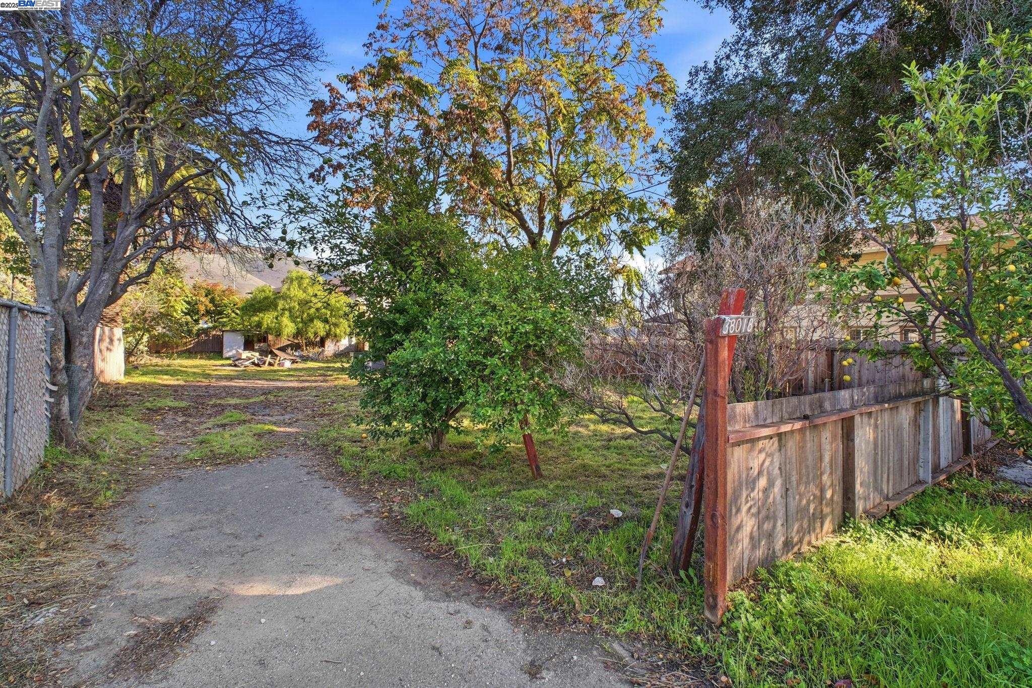 38016 Vallejo Street Fremont, CA 94536 - Photo 32 of 32 a backyard of a house with lots of green space
