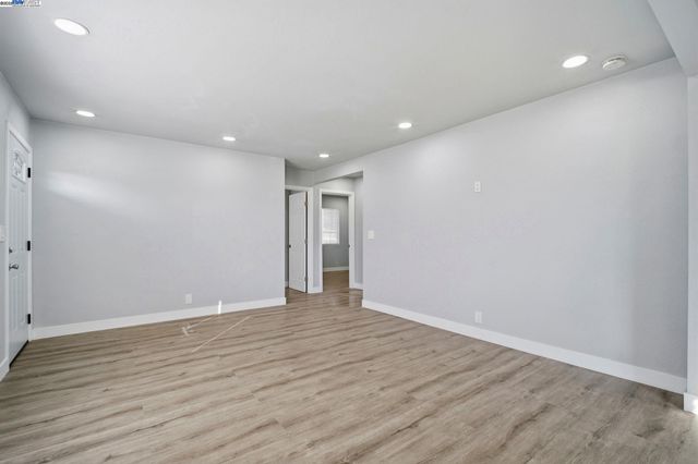 a kitchen with a stove top oven sink and cabinets