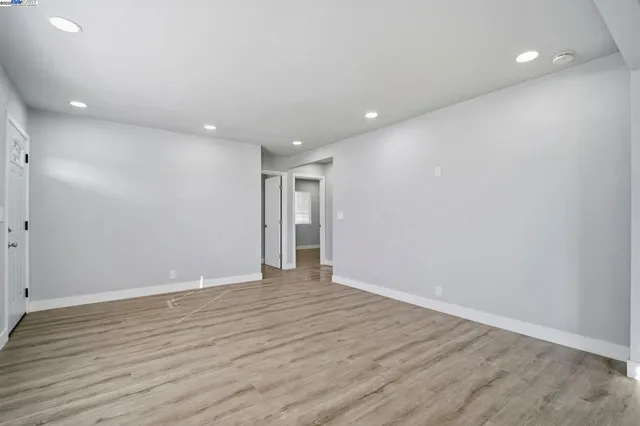 a kitchen with a stove top oven sink and cabinets
