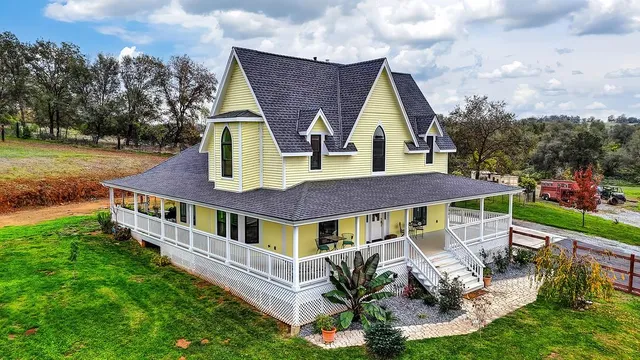 a view of a patio with wooden floor and furniture