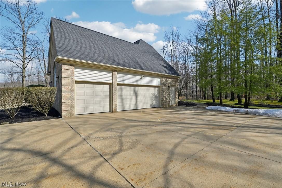 8215 Eagle Ridge Drive Painesville, OH 44077 - Photo 47 of 49 3-car with interior access stairway to basement