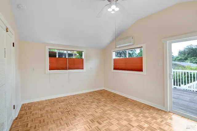 a view of a room with a large window