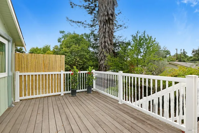 a view of a wooden roof deck