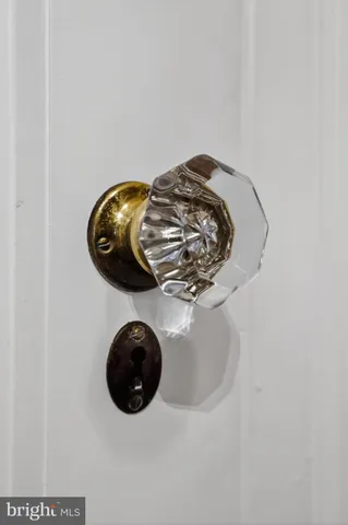 a view of room with window and hardwood