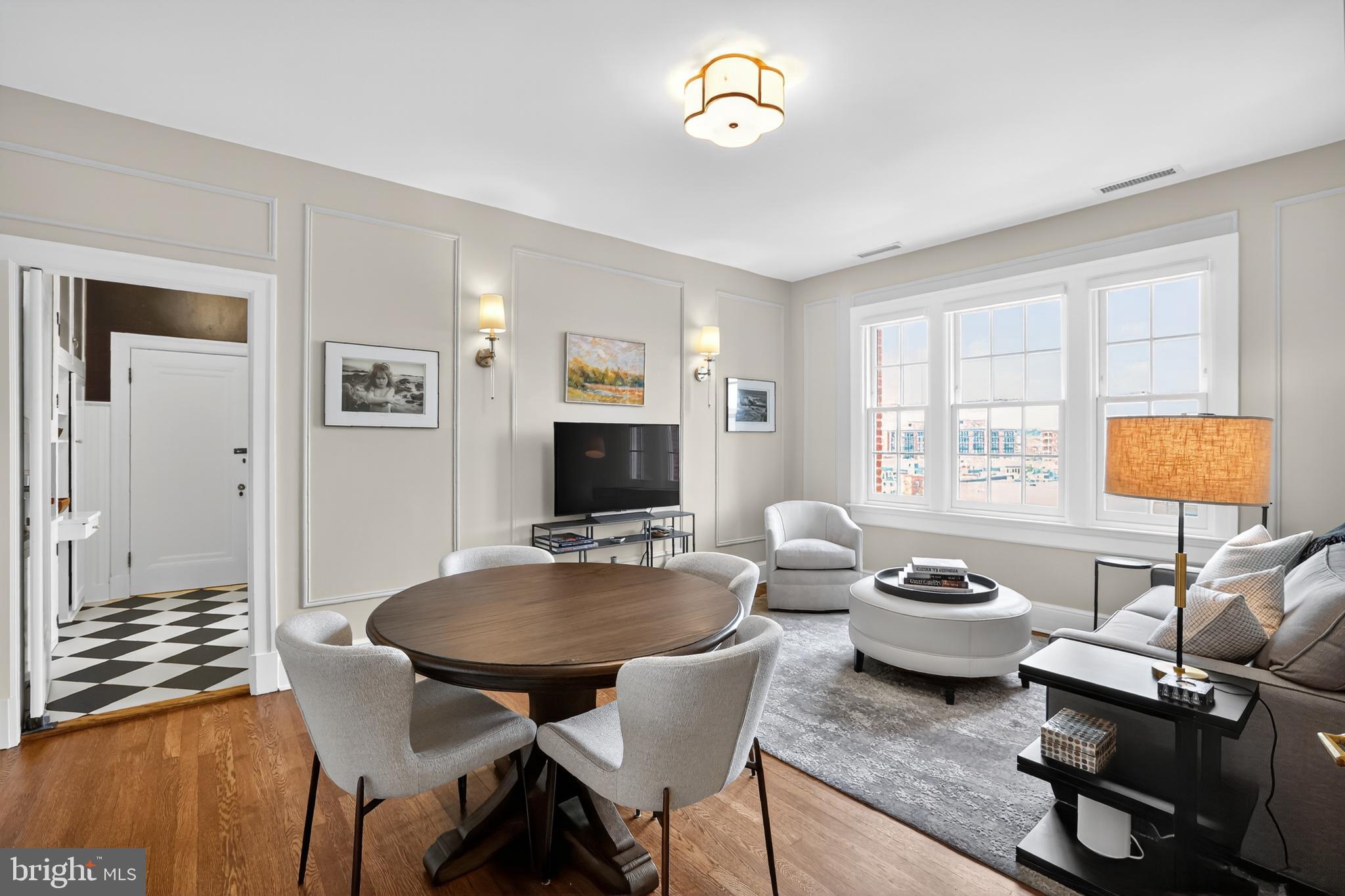1661 Crescent Place Northwest, Unit 604 Washington, DC 20009 - Photo 24 of 61 a living room with furniture and a window