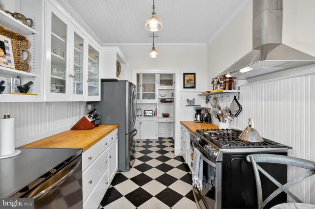 a room with a walk in closet and a window