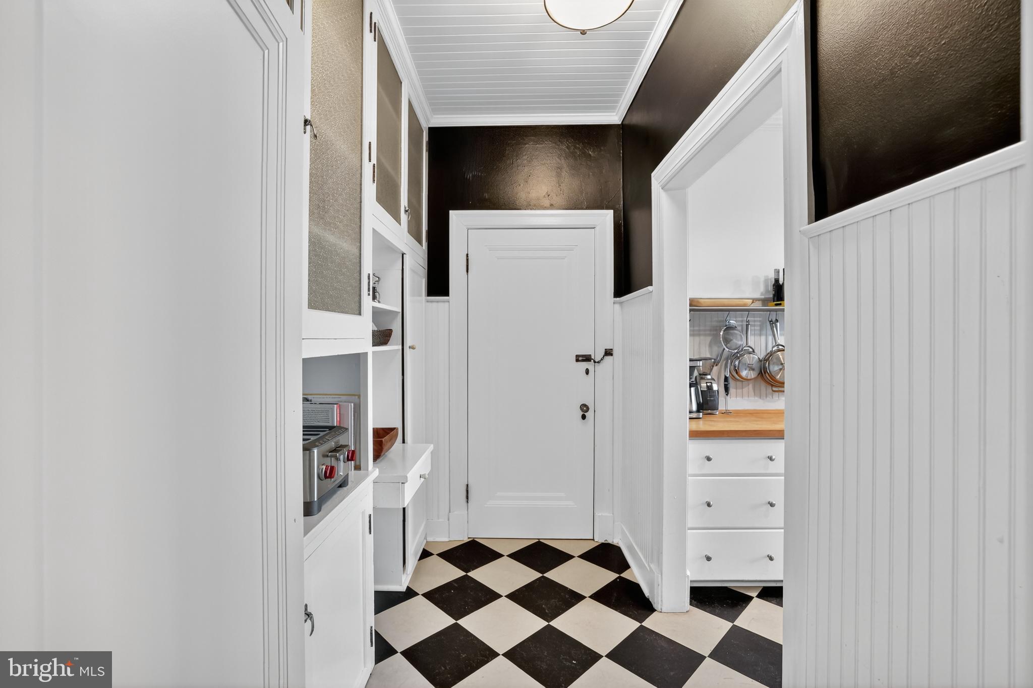 1661 Crescent Place Northwest, Unit 604 Washington, DC 20009 - Photo 38 of 61 a room with a walk in closet and a window