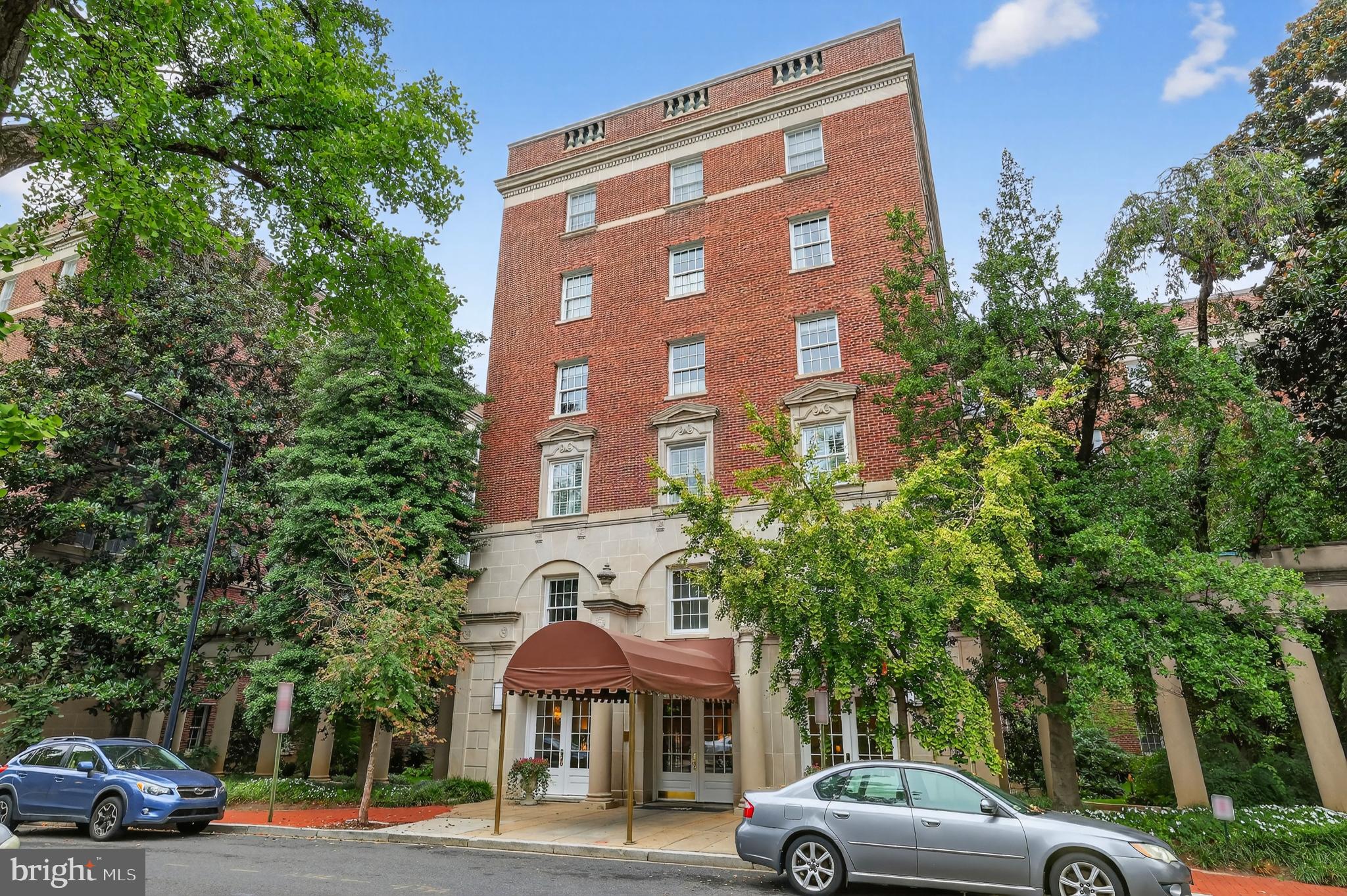 1661 Crescent Place Northwest, Unit 604 Washington, DC 20009 - Photo 43 of 61 a view of a cars parked in front of a building