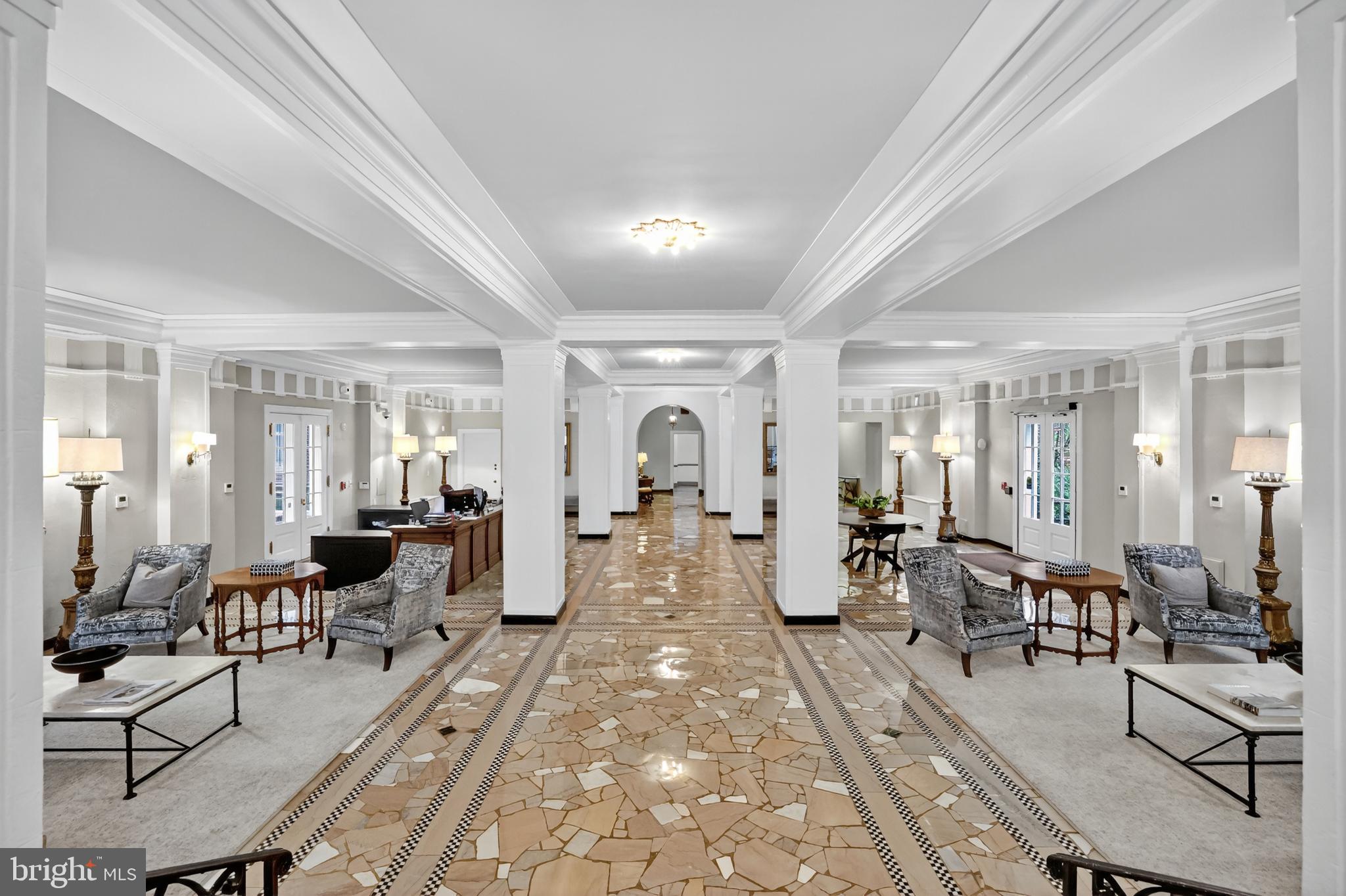 1661 Crescent Place Northwest, Unit 604 Washington, DC 20009 - Photo 44 of 61 a living room with lots of furniture and gym equipment