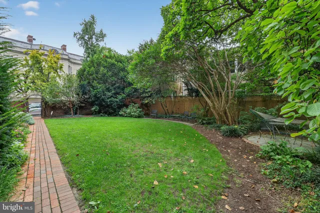 a view of a terrace with seating area