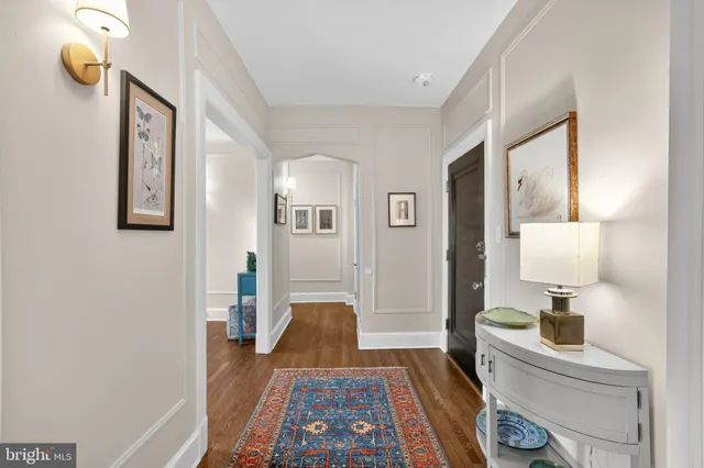 a bed room with a bed and a lamp