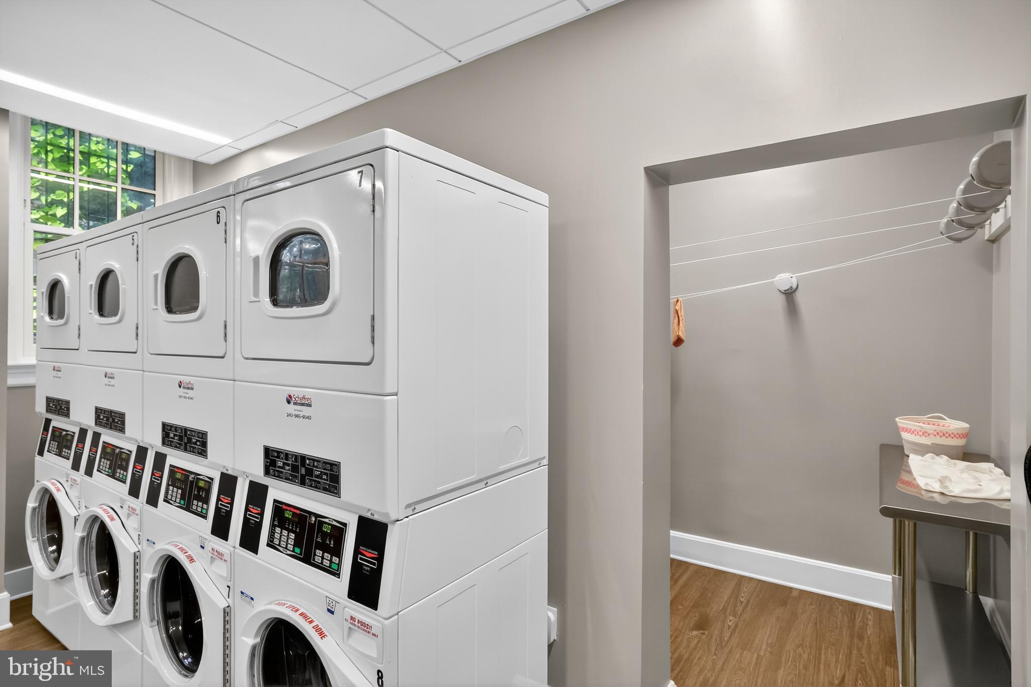 1661 Crescent Place Northwest, Unit 604 Washington, DC 20009 - Photo 53 of 61 a view of a utility room with washer and dryer