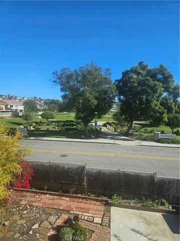 a bathroom with a double vanity sink a mirror and a shower