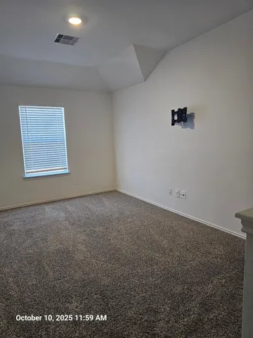 an empty room with a workbench