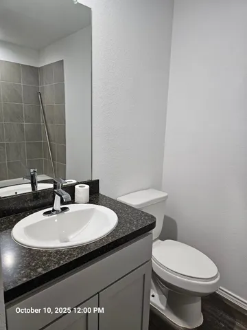 a bathroom with a sink and a toilet