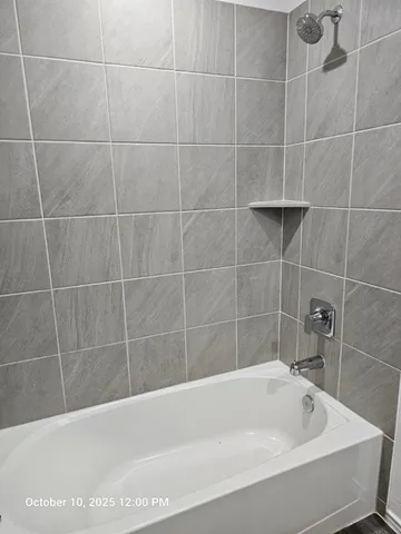 a bathroom with a bathtub