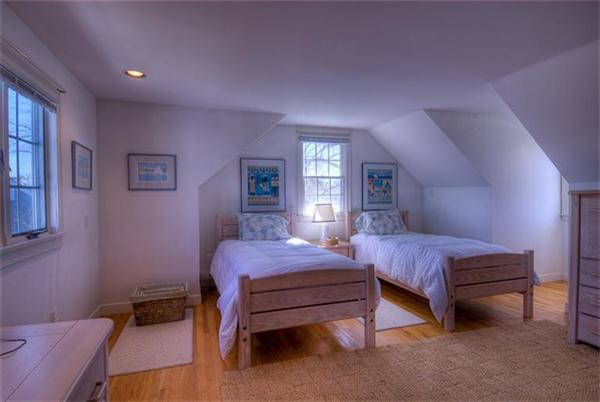 145 Salten Point Road Barnstable, MA 02630 - Photo 24 of 30 a bedroom with a bed and a window