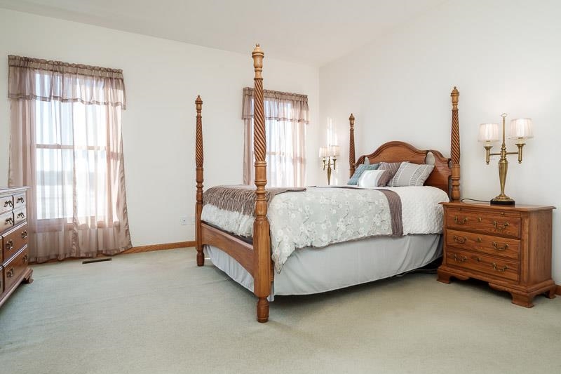 19905 State Line Road Harvard, IL 60033 - Photo 19 of 55 a bed room with a bed and a window