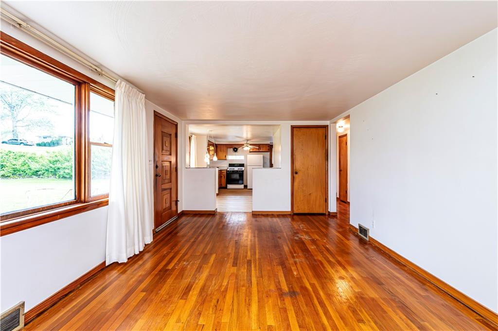 13740 Ridge Road Irwin, PA 15642 - Photo 5 of 43 a view of a kitchen with wooden floor and a kitchen