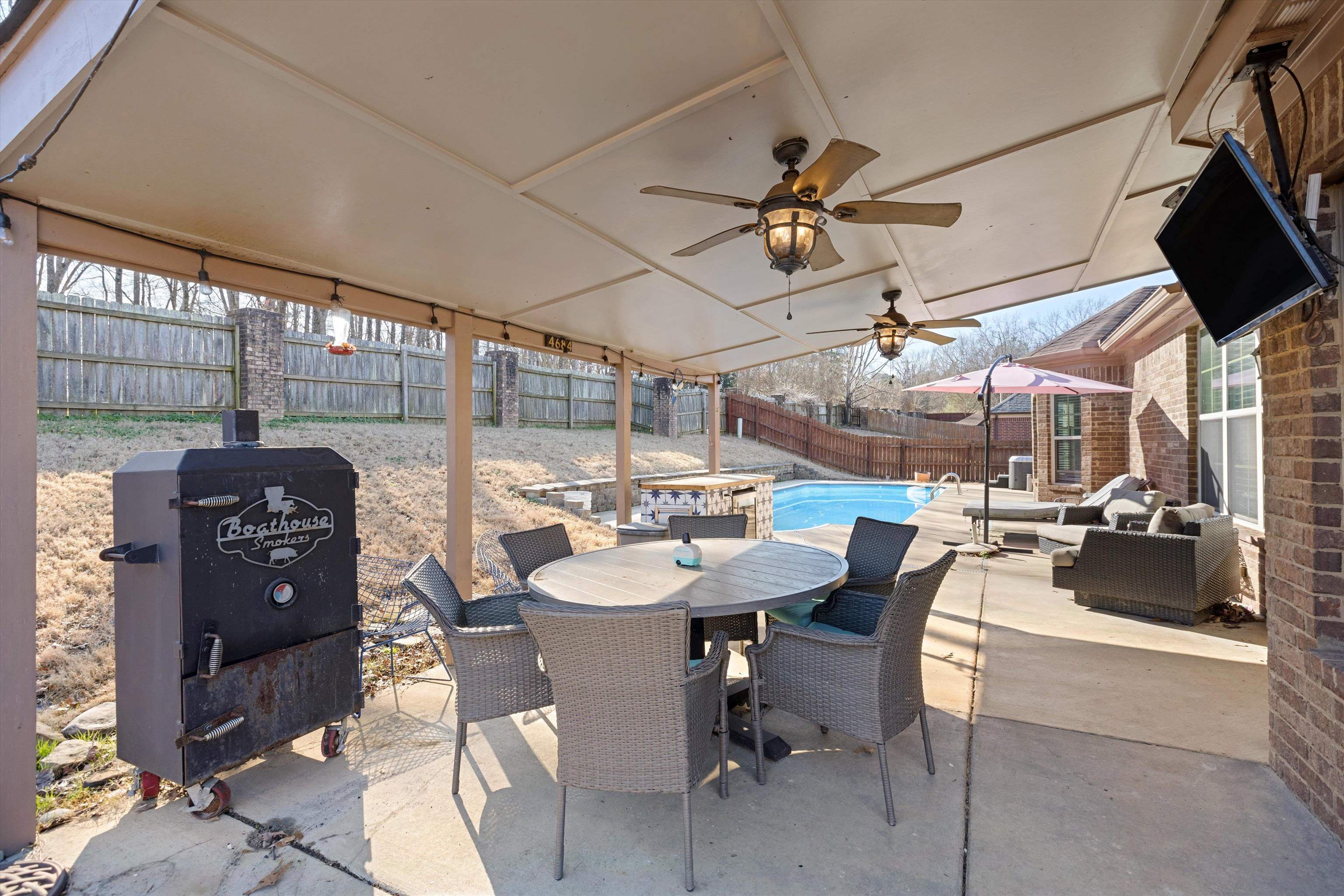 6005 Maher Valley Cove Bartlett, TN 38135 - Photo 15 of 28 a dining room with furniture and a chandelier