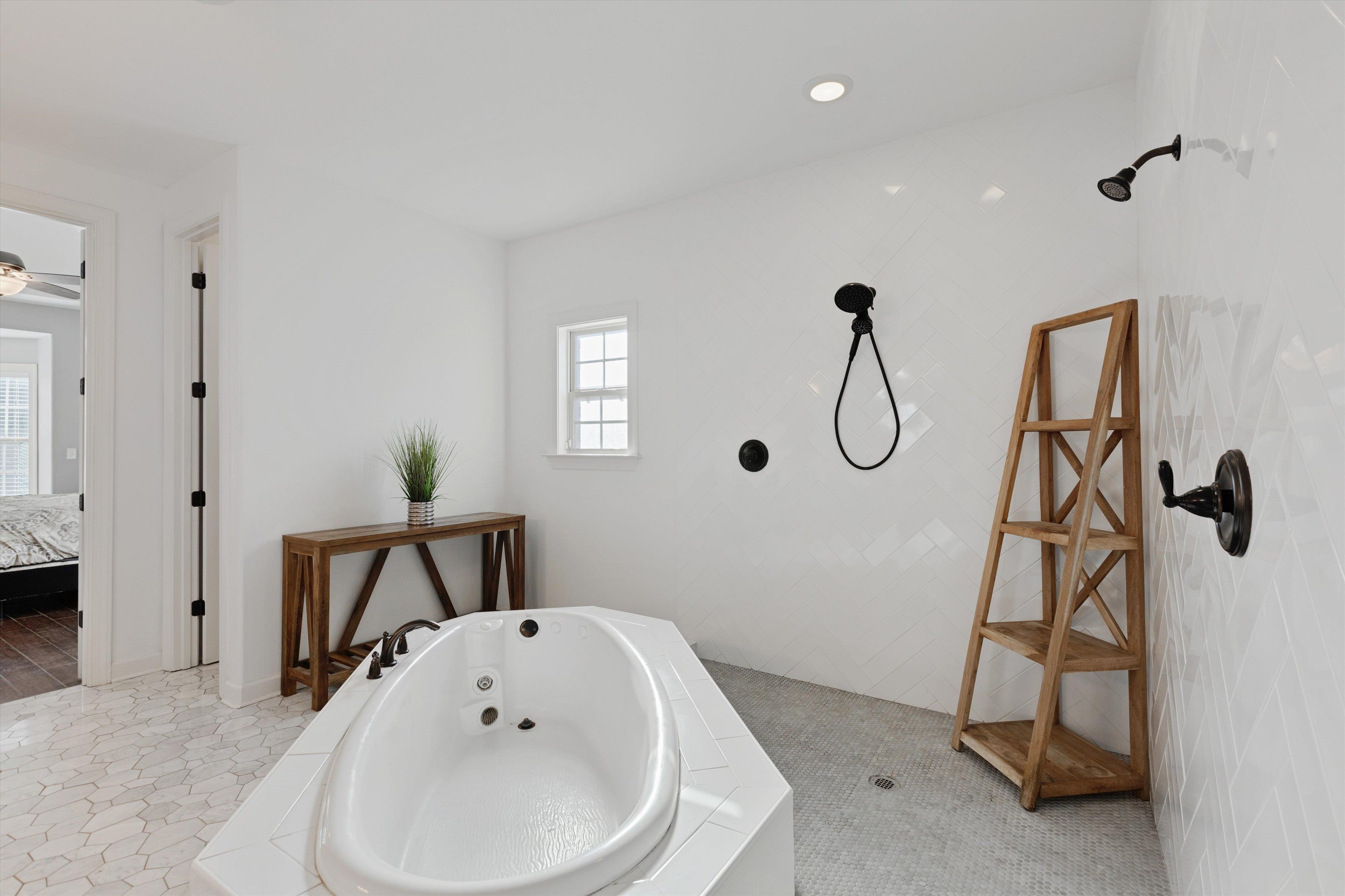 6005 Maher Valley Cove Bartlett, TN 38135 - Photo 3 of 28 a bathroom with a sink and a mirror