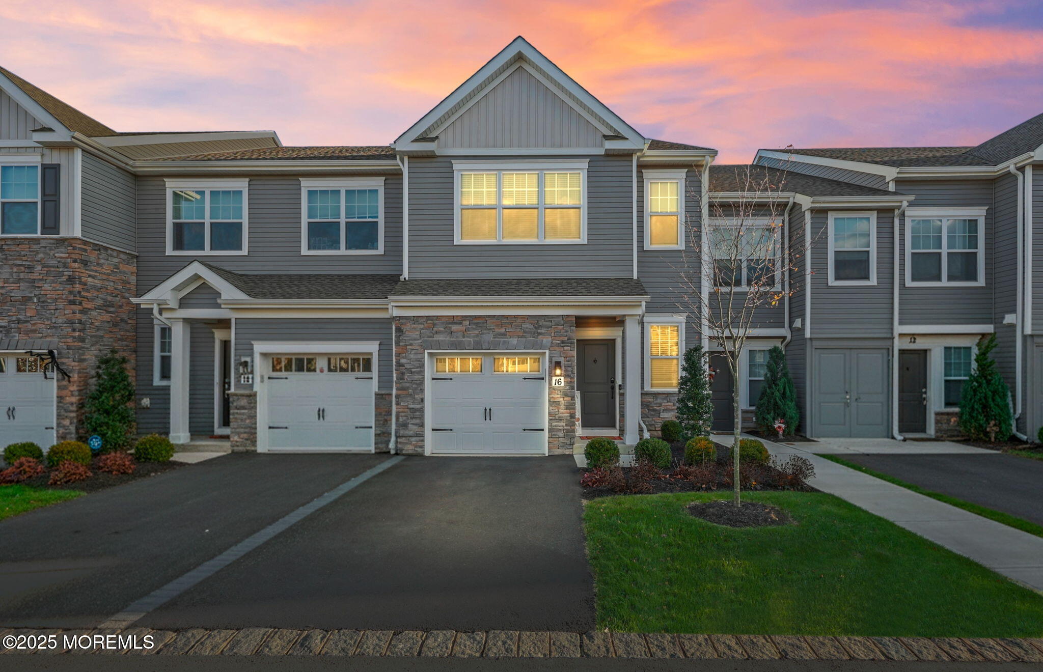 16 Chapel Lane Neptune, NJ 07753 - Photo 1 of 26 front view of house with a yard