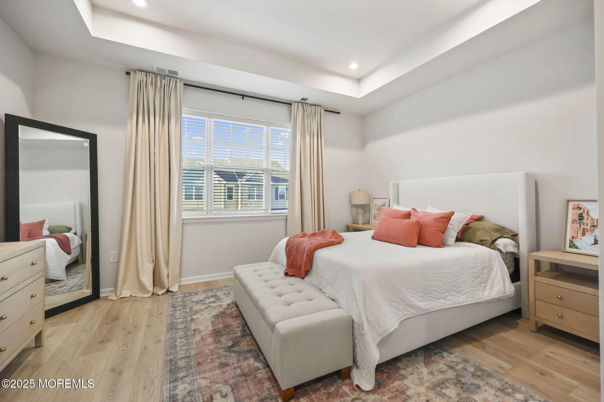 16 Chapel Lane Neptune, NJ 07753 - Photo 16 of 26 a bedroom with a bed and wooden floor