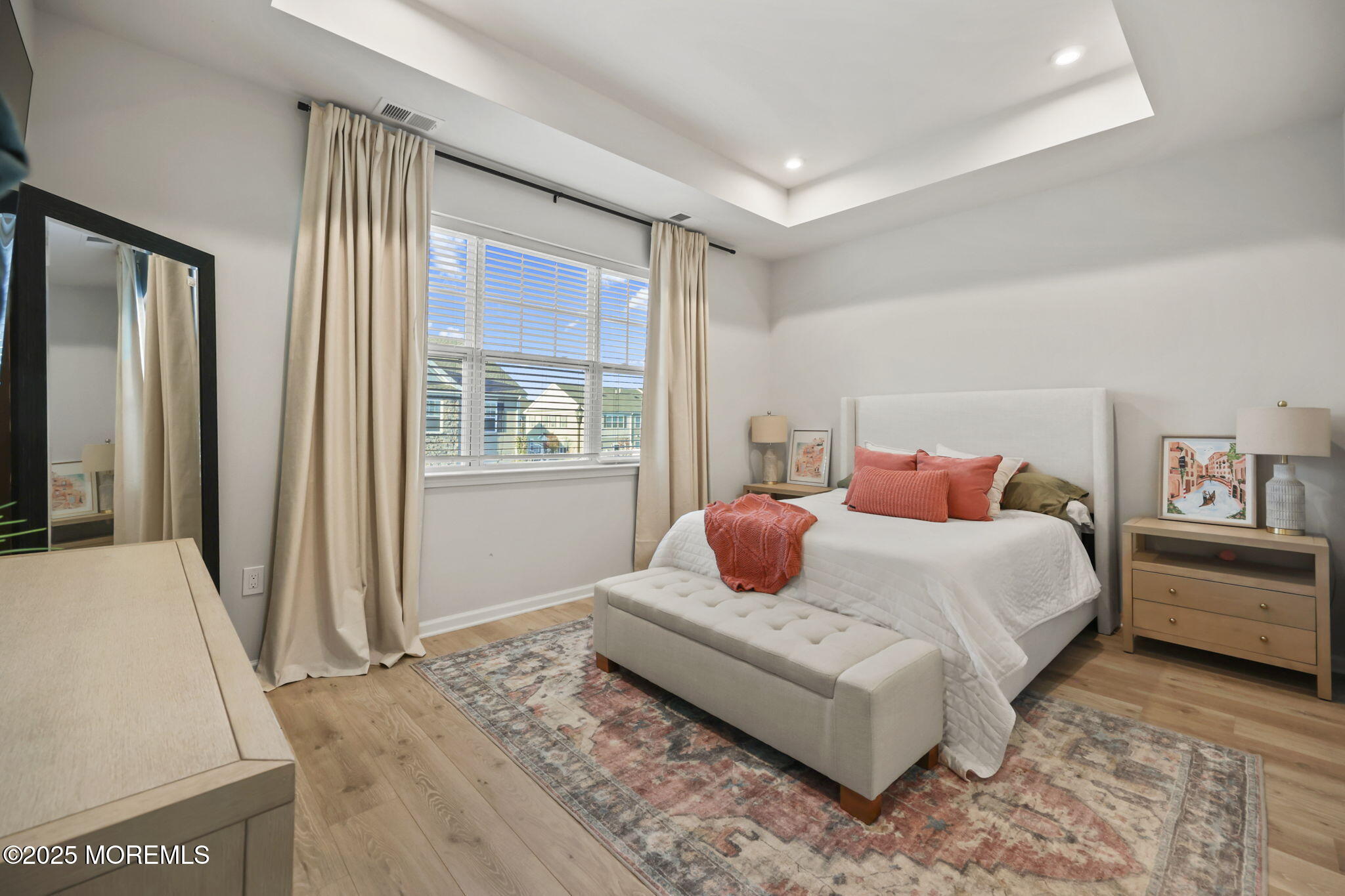 16 Chapel Lane Neptune, NJ 07753 - Photo 17 of 26 a bedroom with a bed and wooden floor