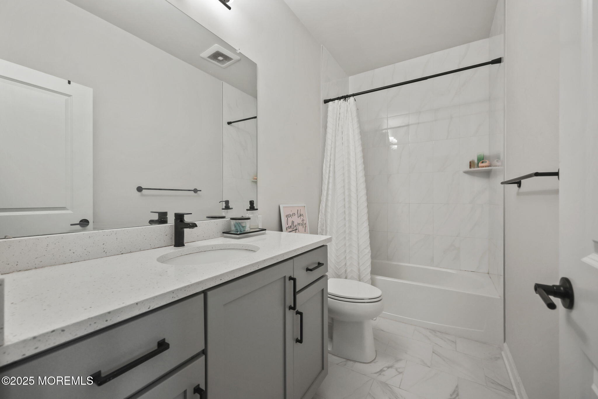 16 Chapel Lane Neptune, NJ 07753 - Photo 22 of 26 a bathroom with a sink a toilet a shower and a mirror