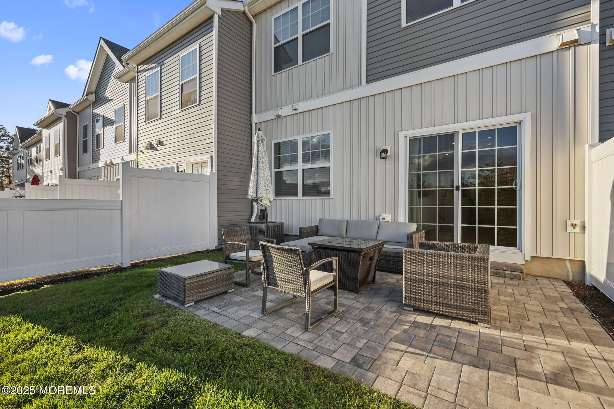 16 Chapel Lane Neptune, NJ 07753 - Photo 26 of 26 a backyard of a house with outdoor seating
