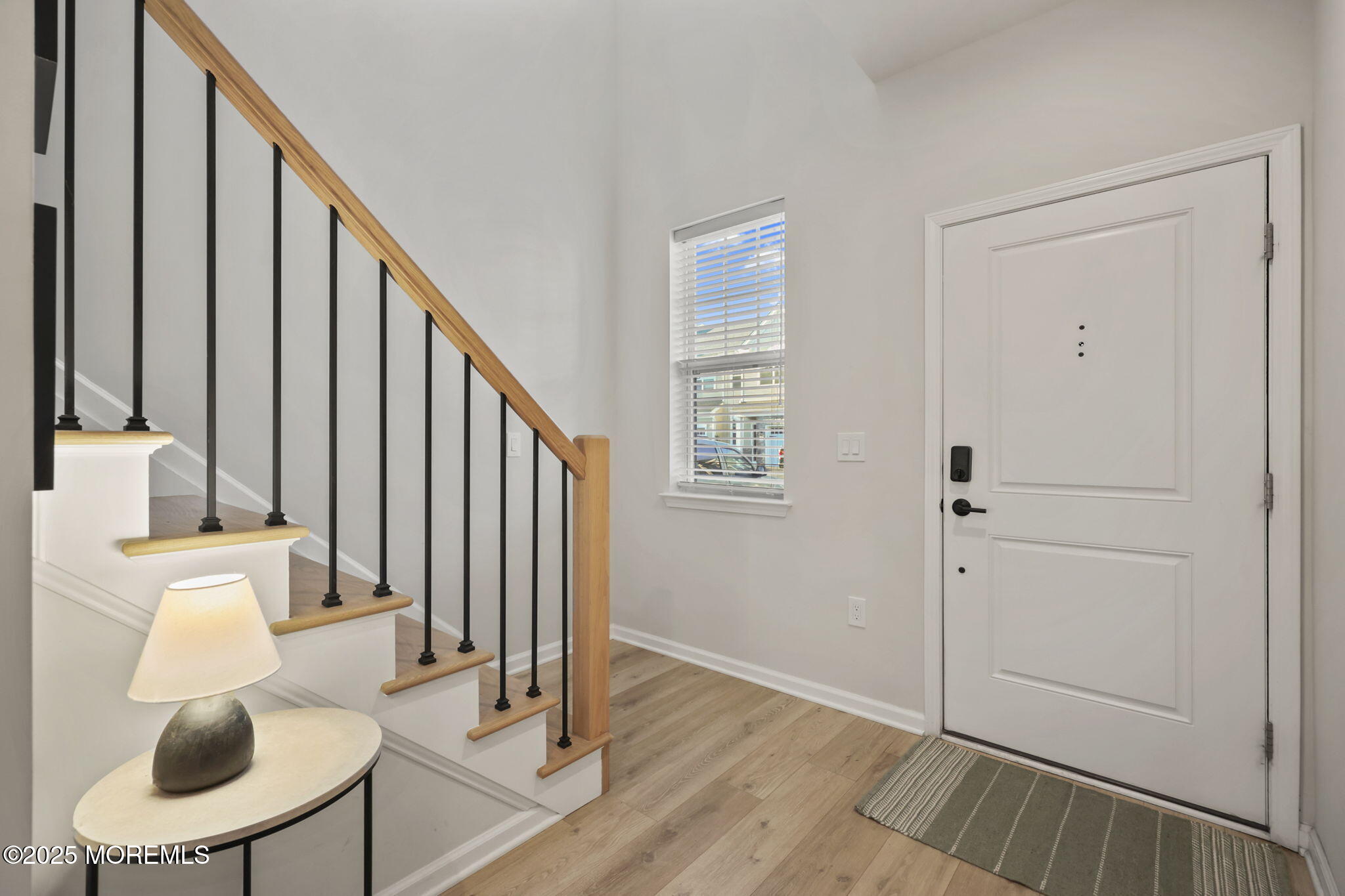 16 Chapel Lane Neptune, NJ 07753 - Photo 5 of 26 a view of entryway and hall with wooden floor