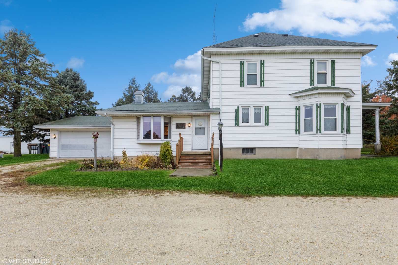 6222 Rich Road DeKalb, IL 60115 - Photo 1 of 31 front view of a house with a yard