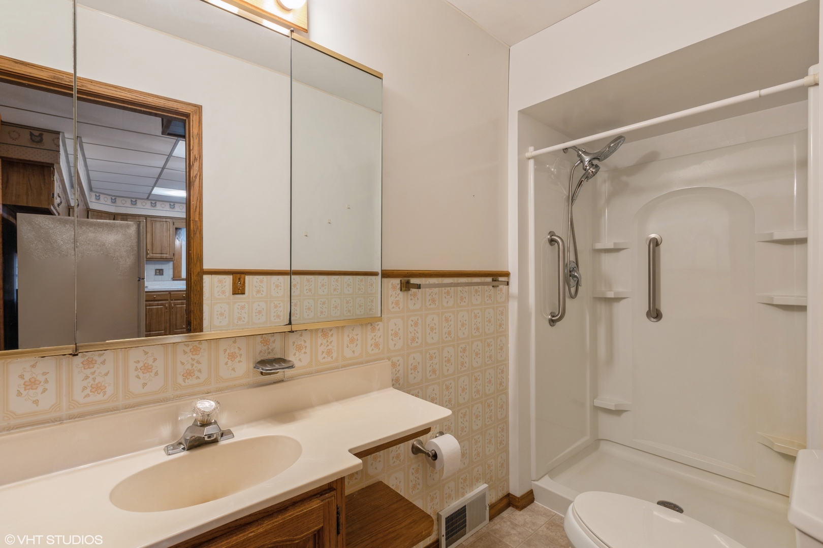 6222 Rich Road DeKalb, IL 60115 - Photo 13 of 31 a bathroom with a sink toilet and shower