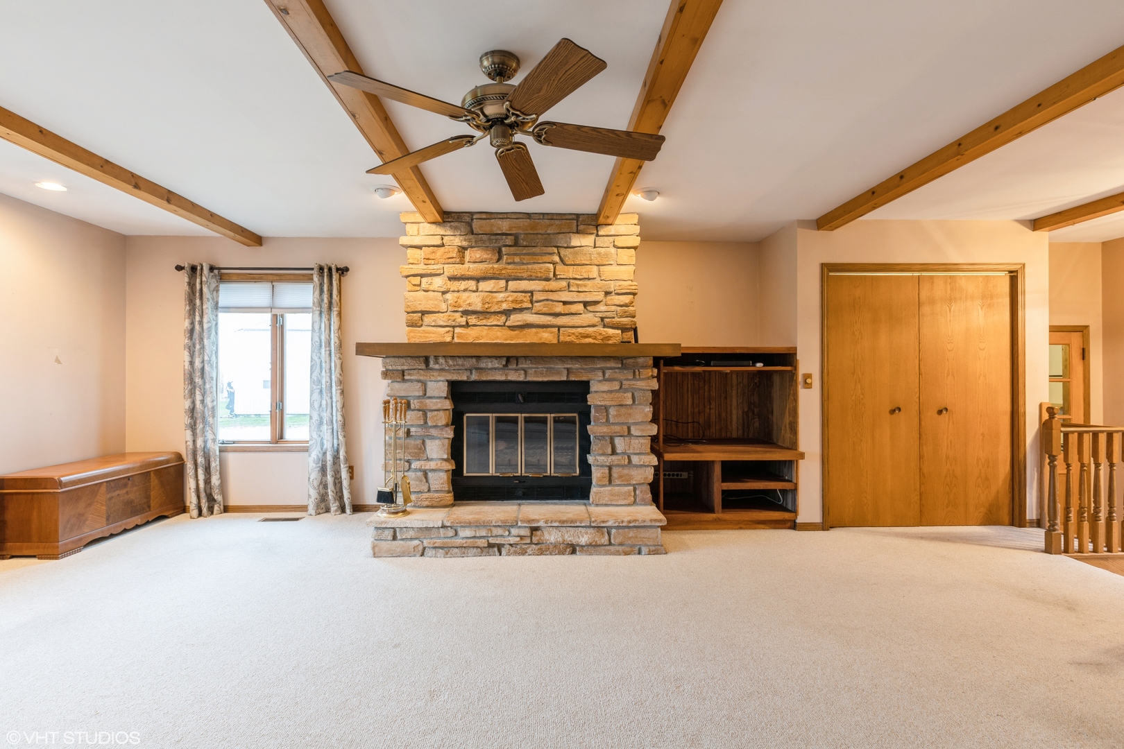 6222 Rich Road DeKalb, IL 60115 - Photo 3 of 31 a big room with fireplace cabinet and windows