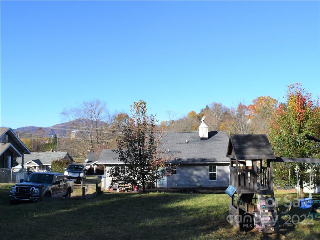 133 Substation Road Canton, NC 28716 - Photo 3 of 8 a view of a house with a yard and sitting area