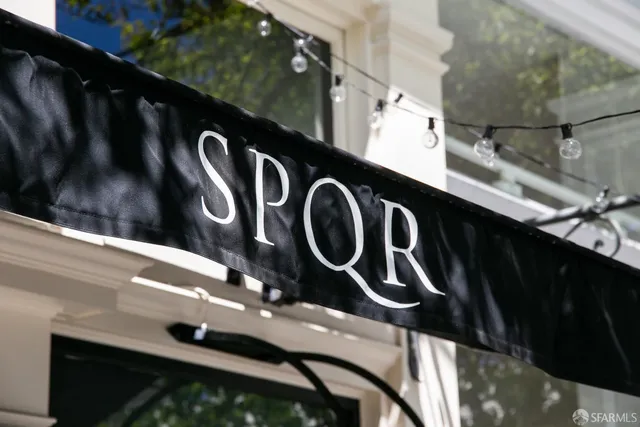 a view of street with sitting area