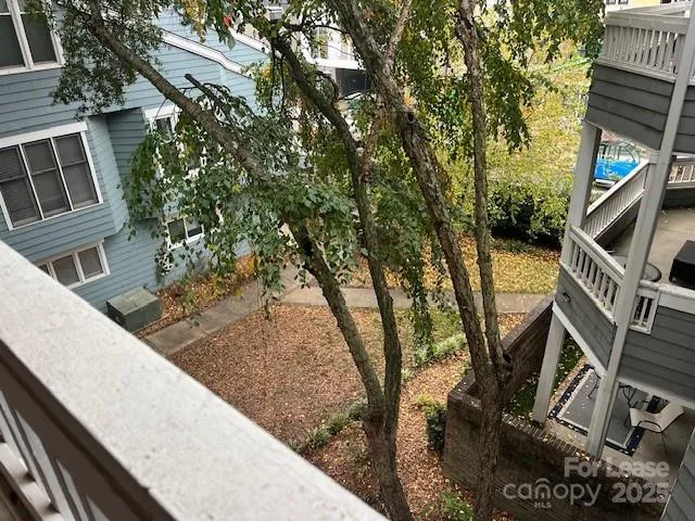 a view of a city street from a house