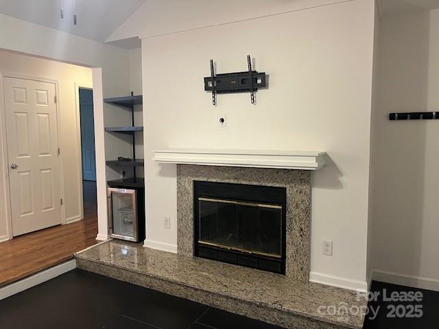 433 West 8th Street, Unit 66 Charlotte, NC 28202 - Photo 9 of 24 a fireplace with a hallway