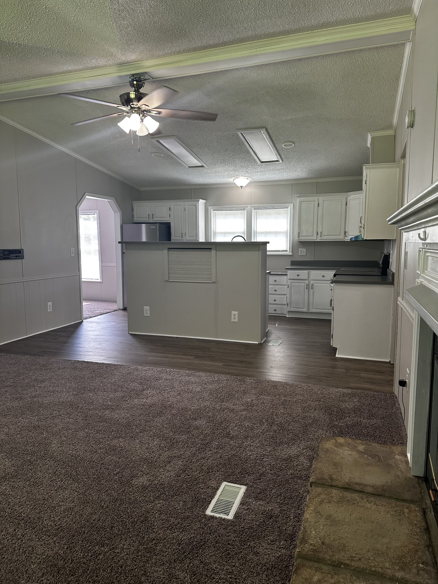 599 Defeated Creek Highway Carthage, TN 37030 - Photo 7 of 22 a view of a kitchen with a sink and cabinets