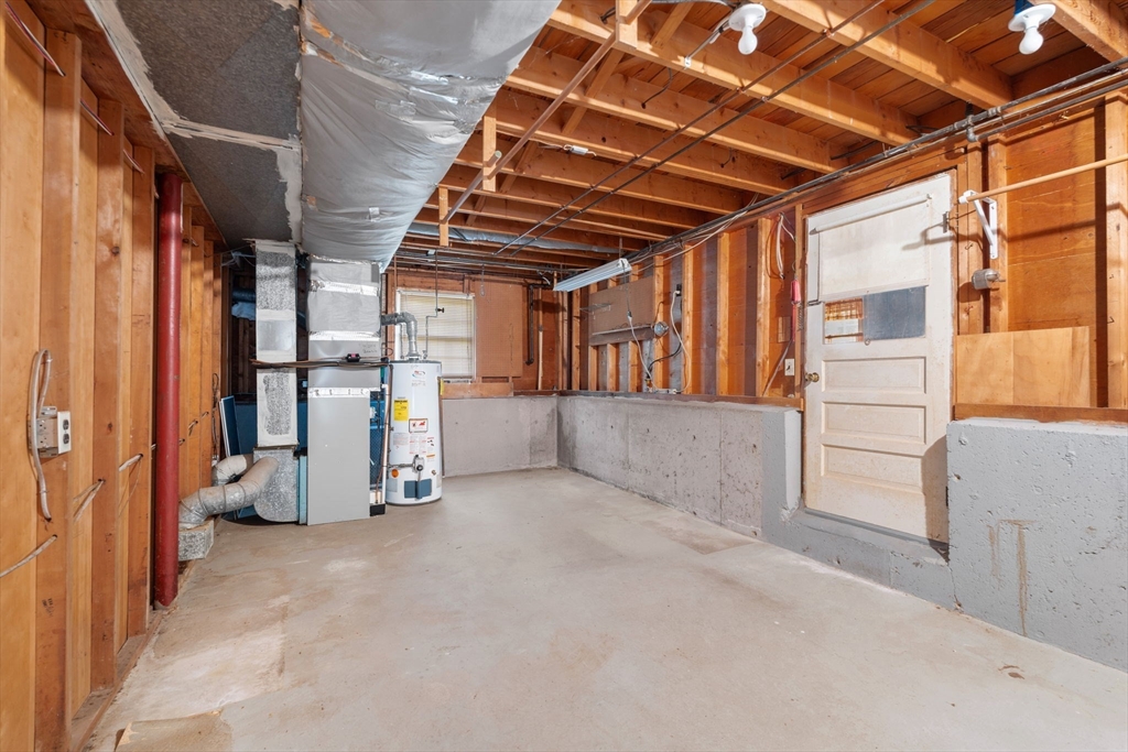348 Belknap Road Framingham, MA 01701 - Photo 28 of 35 a view of an empty room with wooden walls