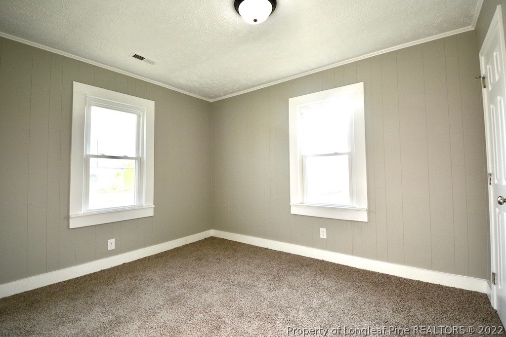 8493 Godwin-Falcon Road Godwin, NC 28344 - Photo 13 of 19 an empty room with windows