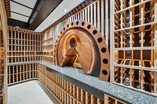 a view of a black door and a shower