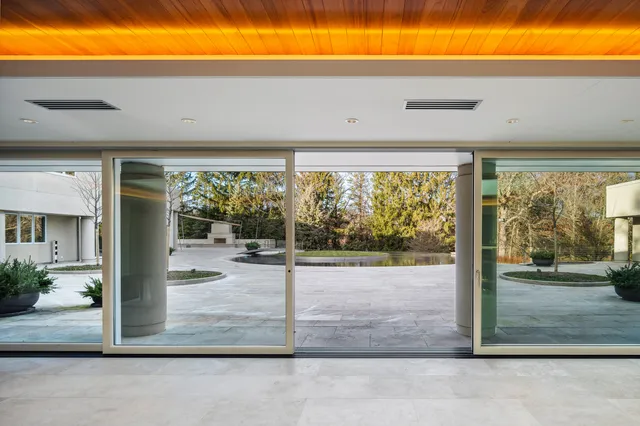 a view of a living room and window