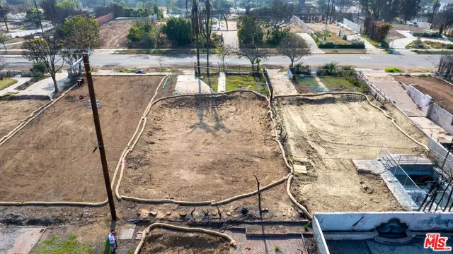 a view of swimming pool with a yard and seating area