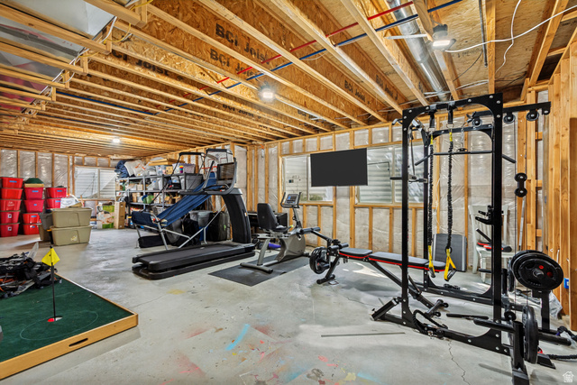40 Wheeler Road Heber City, UT 84032 - Photo 31 of 41 Unfinished basement with exposed wood joists and concrete flooring