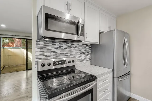 a bedroom with bed and a window