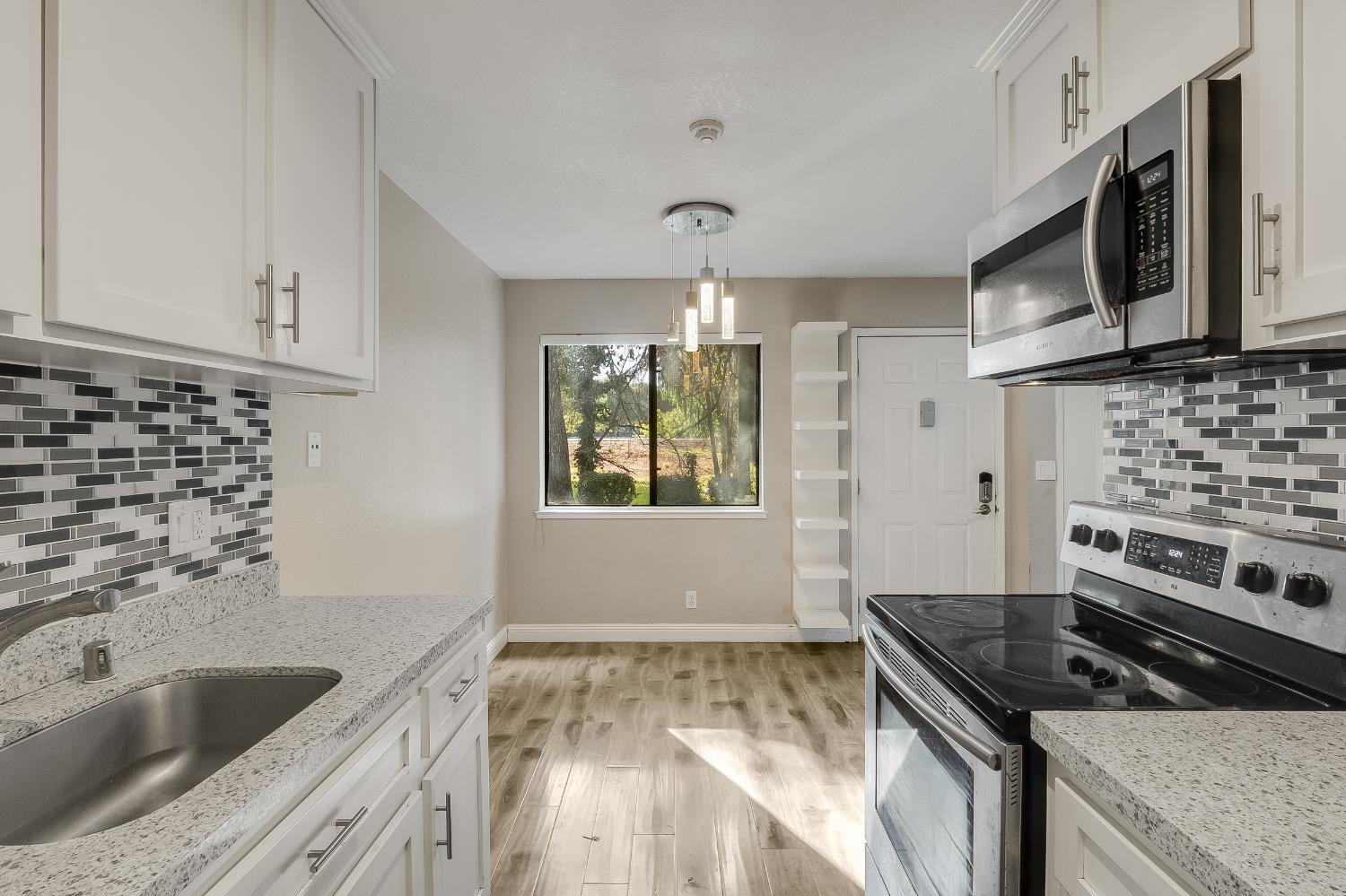 2623 Copa Del Oro Drive Union City, CA 94587 - Photo 29 of 55 a kitchen that has a sink and a stove