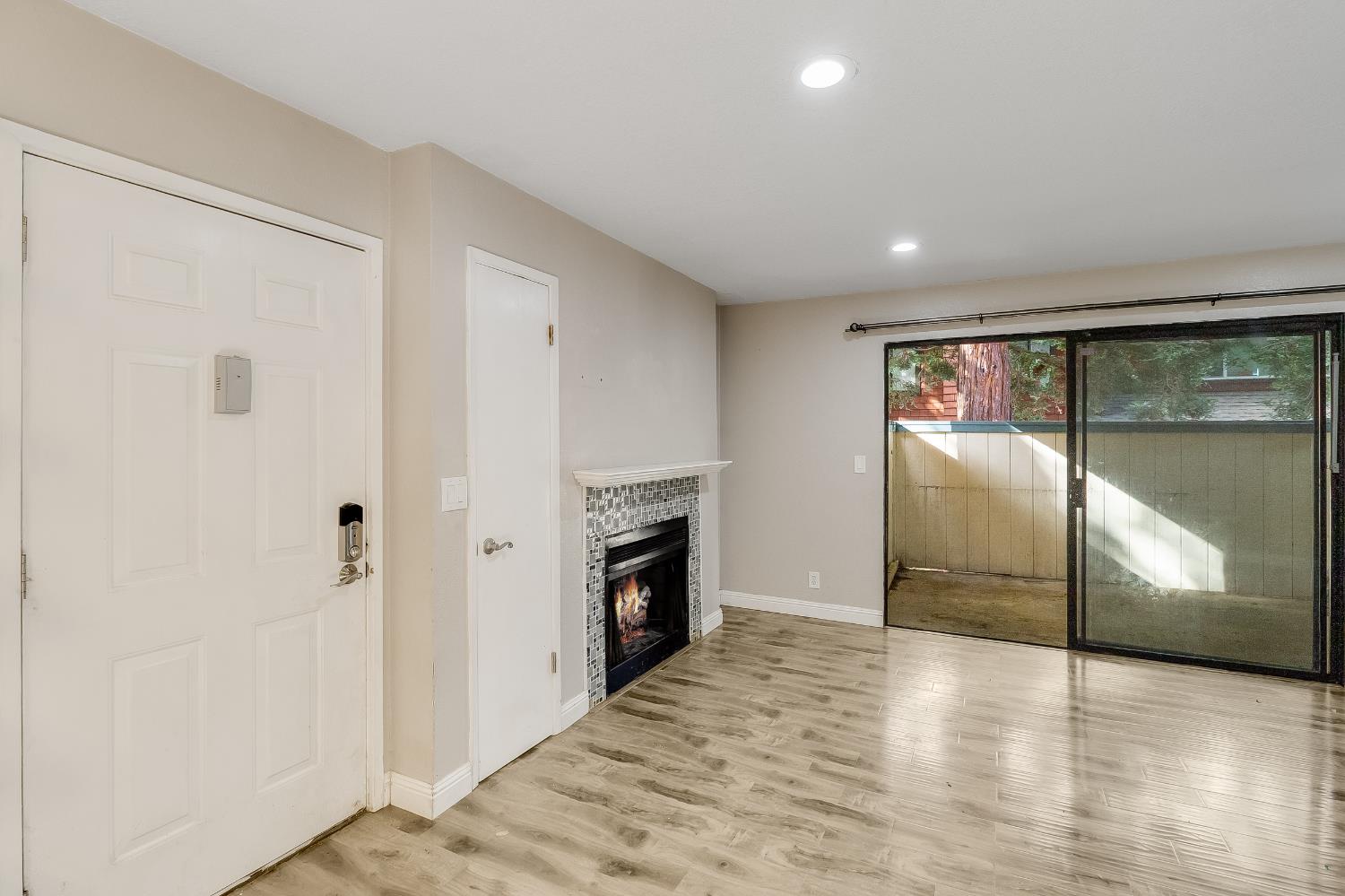 2623 Copa Del Oro Drive Union City, CA 94587 - Photo 30 of 55 an empty room with wooden floor and fireplace
